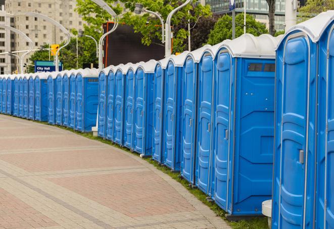 a row of sleek and modern portable restrooms at a special outdoor event in Berino NM